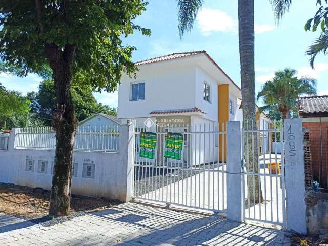 Casa em condomínio fechado com 2 quartos à venda na Rua Gildo de Freitas, 1085, Olaria, Canoas, 69 m2 por R$ 249.000