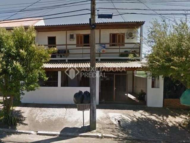 Casa em condomínio fechado com 5 quartos à venda na Rua Júlio Cardoso de Araújo, 225, Harmonia, Canoas, 239 m2 por R$ 422.000