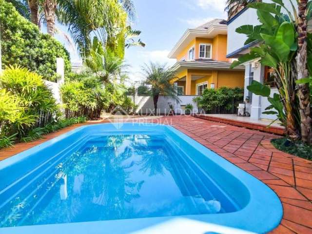 Casa em condomínio fechado com 5 quartos à venda na Avenida Farroupilha, 4201, Marechal Rondon, Canoas, 308 m2 por R$ 3.040.000