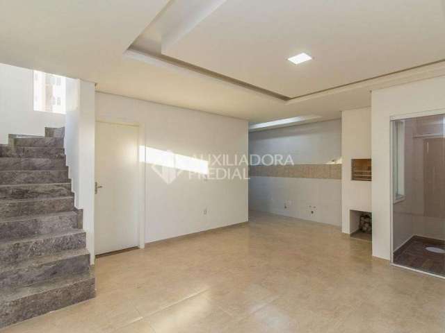 Casa em condomínio fechado com 3 quartos à venda na Rua Antônio Lourenço Rosa, 225, Mato Grande, Canoas, 98 m2 por R$ 369.550