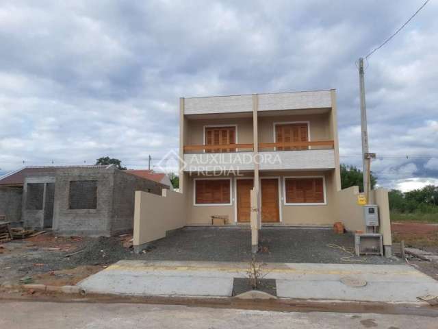 Casa em condomínio fechado com 2 quartos à venda na Rua Quatorze, 159, Estância Velha, Canoas, 77 m2 por R$ 382.000