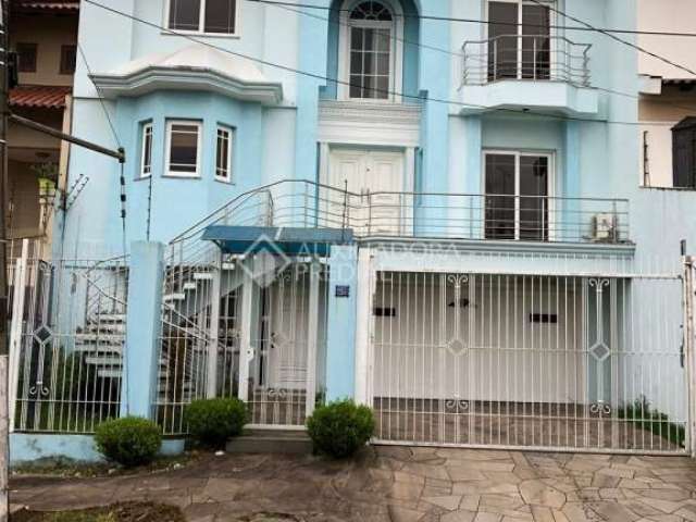 Casa em condomínio fechado com 3 quartos à venda na Rua Vinícius de Moraes, 71, Marechal Rondon, Canoas, 390 m2 por R$ 2.500.000