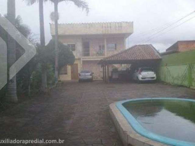 Casa em condomínio fechado com 4 quartos à venda na Rua Santos Dumont, 567, Niterói, Canoas, 222 m2 por R$ 650.000