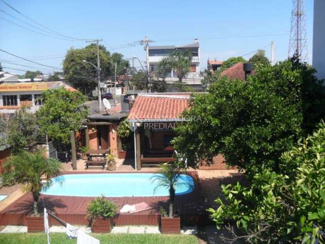 Casa com 3 quartos à venda na Rua Capiberibe, 318, Igara, Canoas, 256 m2 por R$ 1.250.000