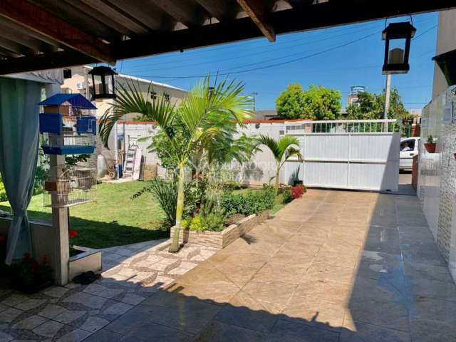 Casa com 3 quartos à venda na Rua Bartolomeu Bueno, 87, Rio Branco, Canoas, 125 m2 por R$ 350.000