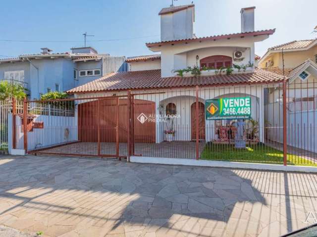 Casa com 3 quartos à venda na Avenida Doutor Sezefredo Azambuja Vieira, 154, Marechal Rondon, Canoas, 253 m2 por R$ 1.300.000