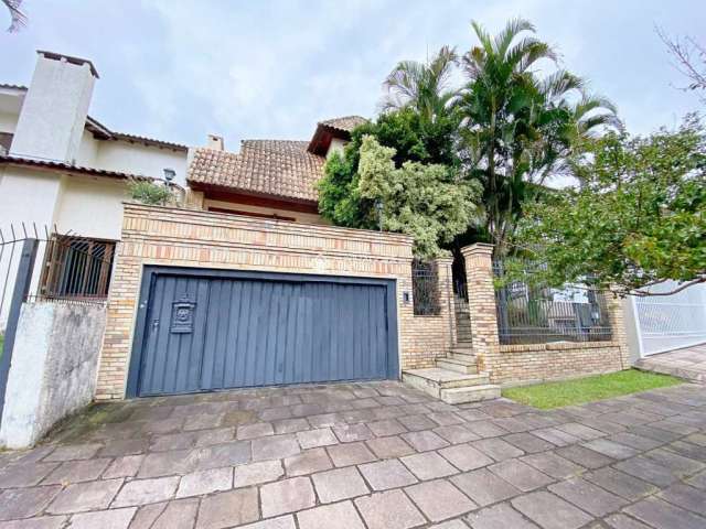 Casa com 4 quartos à venda na Rua Comendador Creidy, 77, Chácara das Pedras, Porto Alegre, 400 m2 por R$ 1.400.000