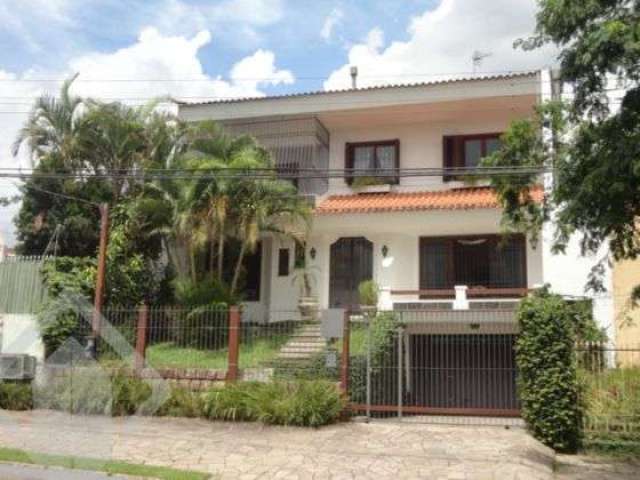 Casa em condomínio fechado com 3 quartos à venda na Beco Circular, 117, Vila Jardim, Porto Alegre, 395 m2 por R$ 1.820.000