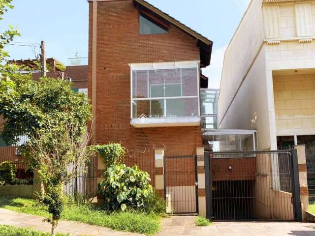 Casa em condomínio fechado com 2 quartos à venda na Rua São Leopoldo, 67, Vila Jardim, Porto Alegre, 170 m2 por R$ 520.000