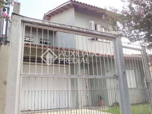 Casa em condomínio fechado com 3 quartos à venda na Rua Irmão Weibert, 233, Vila João Pessoa, Porto Alegre, 141 m2 por R$ 690.000