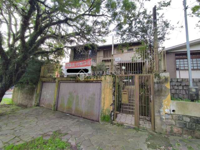 Casa com 3 quartos à venda na Rua Padre Jorge Sedelmayr S J, 85, Vila Ipiranga, Porto Alegre, 300 m2 por R$ 939.550