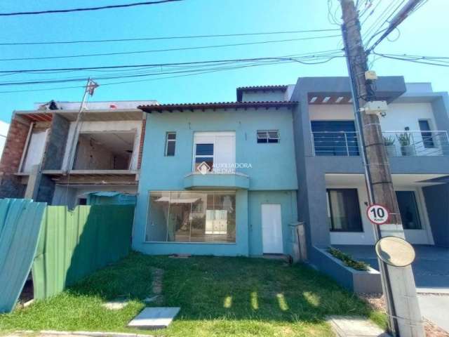 Casa em condomínio fechado com 2 quartos à venda na Rua Deputado Hugo Mardini, 1780, Passo das Pedras, Porto Alegre, 170 m2 por R$ 600.000