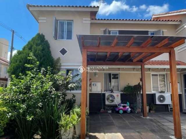 Casa em condomínio fechado com 3 quartos à venda na Avenida Adelino Ferreira Jardim, 140, Rubem Berta, Porto Alegre, 116 m2 por R$ 408.000