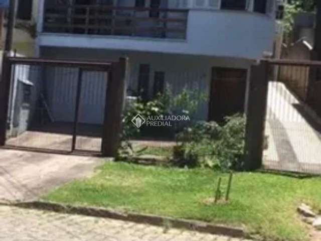 Casa com 4 quartos à venda na Rua Nero José da Silva Filho, 185, Partenon, Porto Alegre, 334 m2 por R$ 850.000