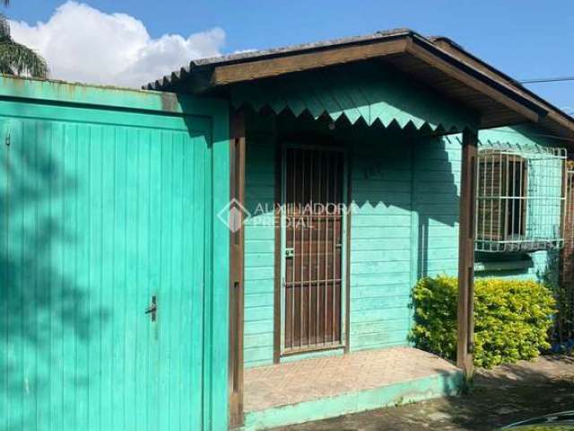 Casa com 2 quartos à venda na Rua Octacílio José Dias, 157, Passo das Pedras, Porto Alegre, 52 m2 por R$ 400.000