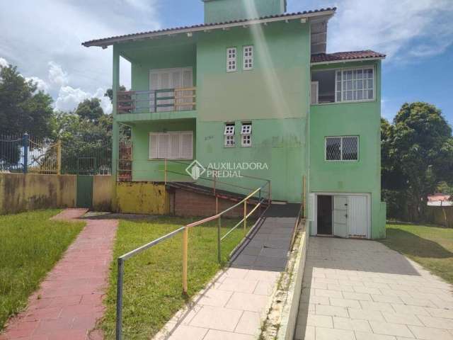 Casa com 4 quartos à venda na Rua Doutor Mário Totta, 2764, Tristeza, Porto Alegre, 307 m2 por R$ 1.295.000