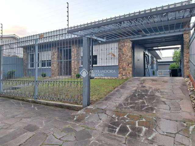 Casa com 4 quartos à venda na Rua Doutor Ney de Almeida Brito, 105, Jardim Lindóia, Porto Alegre, 241 m2 por R$ 1.300.000