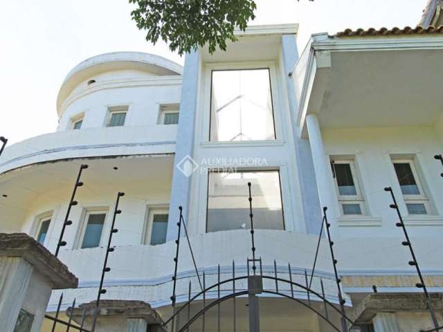 Casa em condomínio fechado com 3 quartos à venda na Avenida Ecoville, 350, Sarandi, Porto Alegre, 520 m2 por R$ 1.990.900