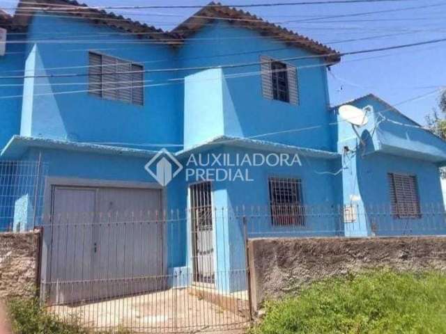 Casa com 4 quartos à venda na Avenida Bernardino Silveira de Amorim, 880, Santa Rosa de Lima, Porto Alegre, 150 m2 por R$ 215.000