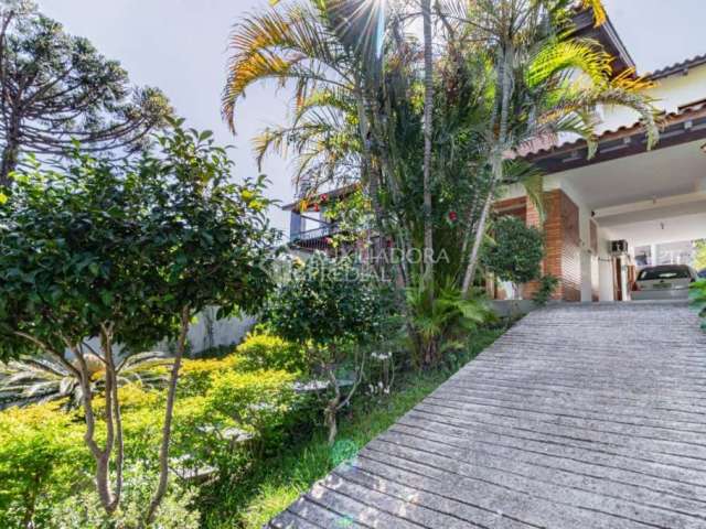 Casa em condomínio fechado com 4 quartos à venda na Rua Manoel Vitorino, 377, Partenon, Porto Alegre, 190 m2 por R$ 750.000