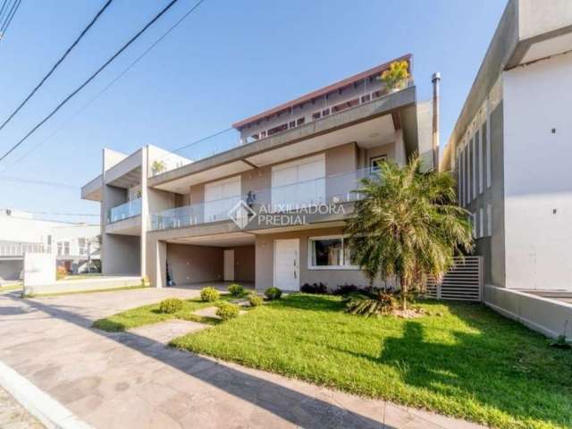 Casa em condomínio fechado com 4 quartos à venda na Rua Ivo Walter Kern, 599, Hípica, Porto Alegre, 329 m2 por R$ 1.860.000