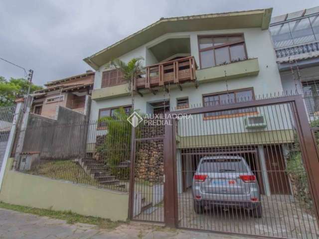 Casa com 4 quartos à venda na Rua Professor Abílio Azambuja, 136, Jardim do Salso, Porto Alegre, 425 m2 por R$ 1.911.000