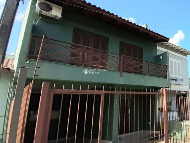 Casa com 4 quartos à venda na Rua Constantino Fernando Onorato Bottin, 224, Hípica, Porto Alegre, 200 m2 por R$ 460.000