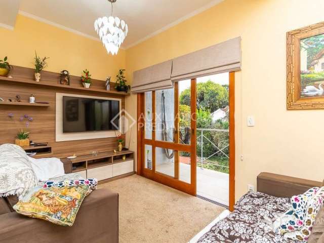 Casa em condomínio fechado com 3 quartos à venda na Rua Jamil Antônio José, 46, Nonoai, Porto Alegre, 145 m2 por R$ 590.000