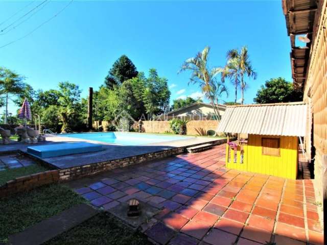 Casa com 3 quartos à venda na Estrada Francisca de Oliveira Vieira, 651, Belém Novo, Porto Alegre, 318 m2 por R$ 957.000