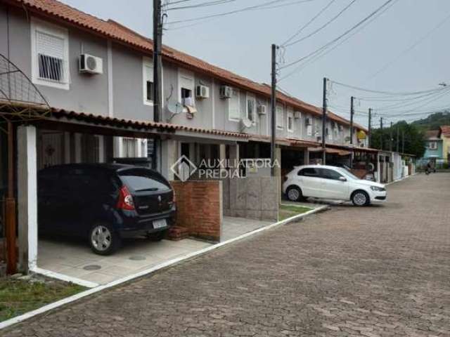 Casa em condomínio fechado com 2 quartos à venda na Rua Alcebíades Ribeiro, 219, Aberta dos Morros, Porto Alegre, 85 m2 por R$ 169.600