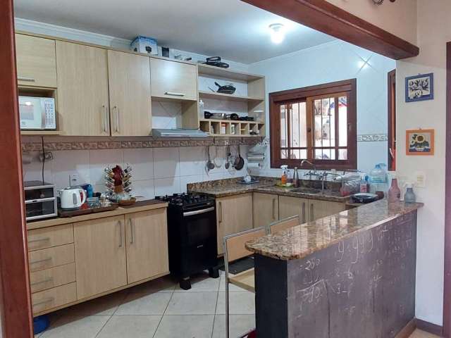 Casa com 3 quartos à venda na Rua Moacyr Godoy Ilha, 186, Espírito Santo, Porto Alegre, 127 m2 por R$ 539.000