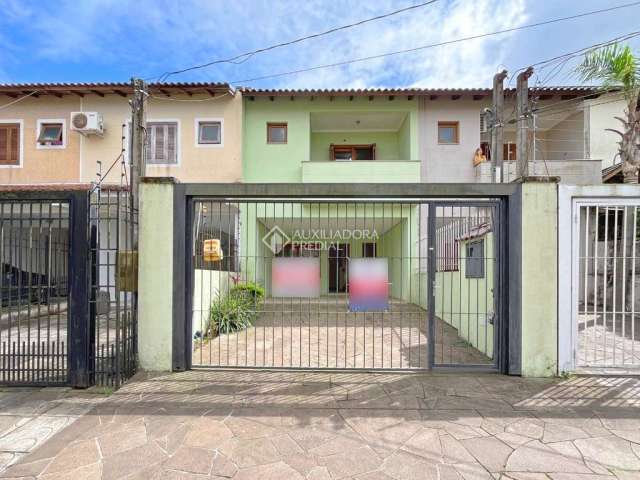 Casa com 3 quartos à venda na Rua Claudio da Silva Pinto, 70, Espírito Santo, Porto Alegre, 150 m2 por R$ 695.000