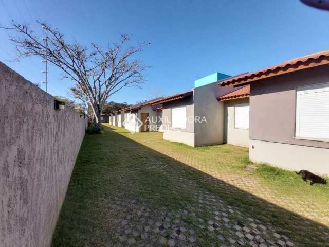 Casa em condomínio fechado com 2 quartos à venda na Rua Santa Mônica, 404, Ponta Grossa, Porto Alegre, 60 m2 por R$ 205.000