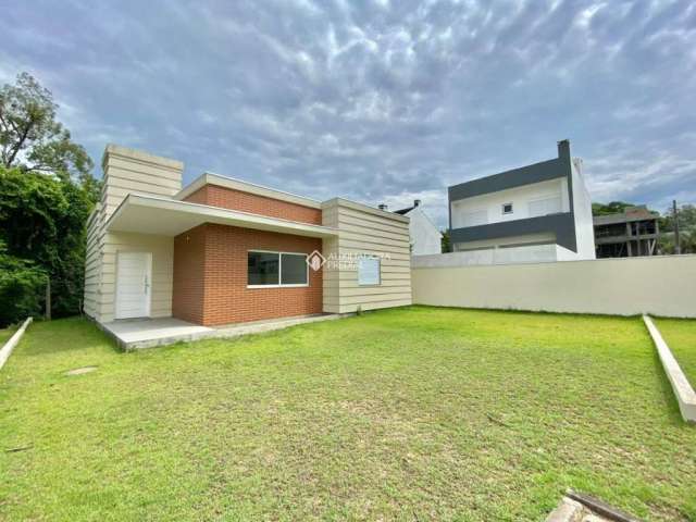 Casa em condomínio fechado com 3 quartos à venda na Rua Canísio Binsfeld, 226, Hípica, Porto Alegre, 123 m2 por R$ 675.000