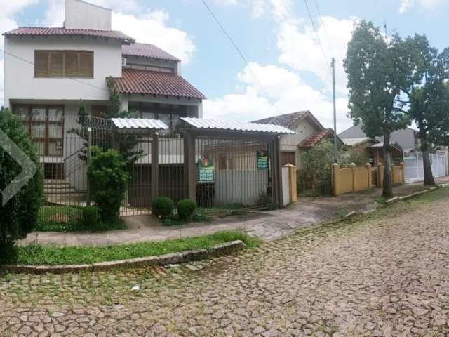 Casa em condomínio fechado com 3 quartos à venda na Rua Olécio Cavedini, 121, Espírito Santo, Porto Alegre, 300 m2 por R$ 950.000