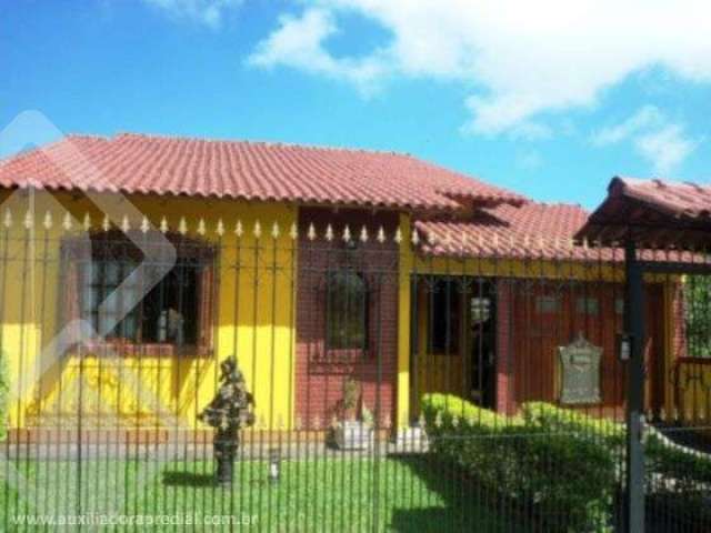 Casa em condomínio fechado com 3 quartos à venda na Rua Doutor Carlos Flores, 198, Belém Novo, Porto Alegre, 150 m2 por R$ 608.000