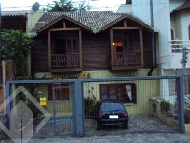 Casa em condomínio fechado com 5 quartos à venda na Rua Mata Coelho, 98, Nonoai, Porto Alegre, 200 m2 por R$ 600.000