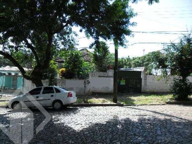 Terreno em condomínio fechado à venda na Rua Erechim, 792, Nonoai, Porto Alegre, 490 m2 por R$ 390.000