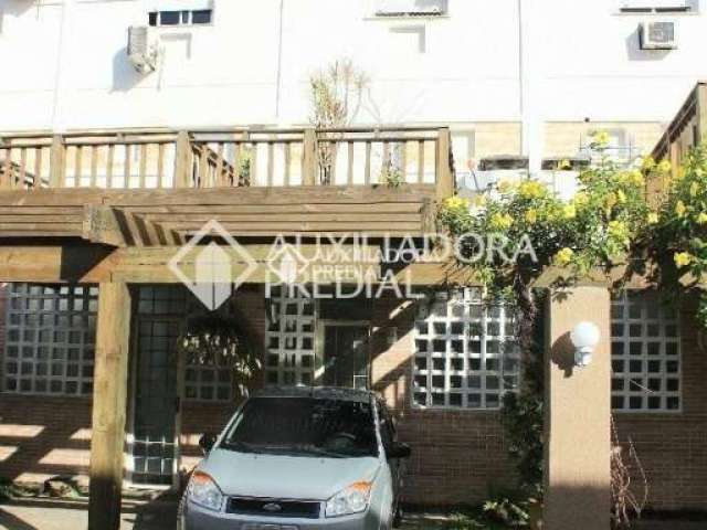 Casa em condomínio fechado com 3 quartos à venda na Avenida Juca Batista, 473, Cavalhada, Porto Alegre, 98 m2 por R$ 384.000