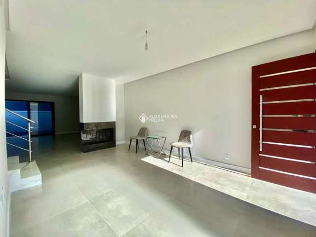 Casa em condomínio fechado com 3 quartos à venda na Rua Embira, 34, Hípica, Porto Alegre, 121 m2 por R$ 624.000