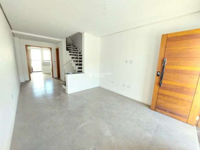 Casa em condomínio fechado com 2 quartos à venda na Rua Canísio Binsfeld, 290, Hípica, Porto Alegre, 80 m2 por R$ 438.000
