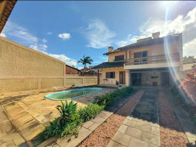 Casa com 4 quartos à venda na Rua Santa Vitória do Palmar, 683, Jardim Mauá, Novo Hamburgo, 334 m2 por R$ 990.000