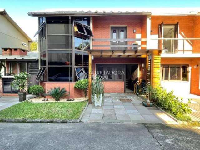 Casa em condomínio fechado com 2 quartos à venda na Rua João Wendelino Hennemann, 444, Rondônia, Novo Hamburgo, 98 m2 por R$ 375.000