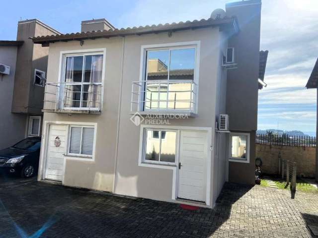 Casa em condomínio fechado com 2 quartos à venda na Rua Attilio Forte, 180, Boa Saúde, Novo Hamburgo, 79 m2 por R$ 230.000