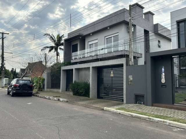 Casa com 4 quartos à venda na Rua Carazinho, 130, Ideal, Novo Hamburgo, 326 m2 por R$ 1.300.000