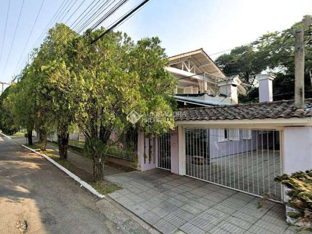 Casa com 4 quartos à venda na Rua Gustavo Leopoldo Feltes, 275, Canudos, Novo Hamburgo, 276 m2 por R$ 450.000