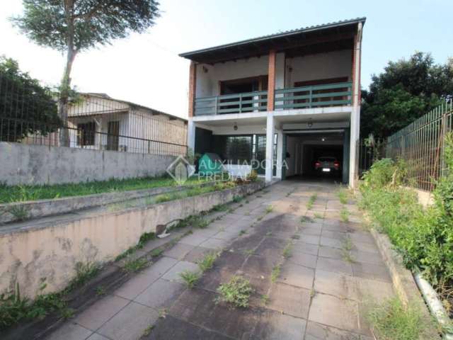 Casa em condomínio fechado com 3 quartos à venda na Rua Osvaldo Cruz, 983, Primavera, Novo Hamburgo, 229 m2 por R$ 460.000