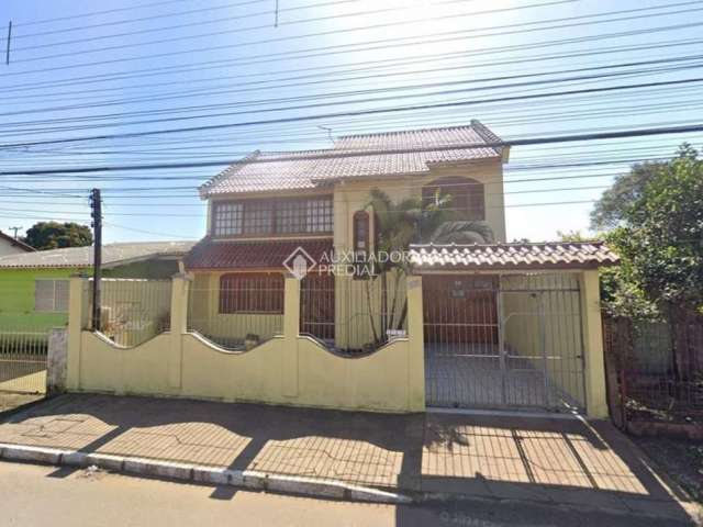 Casa em condomínio fechado com 3 quartos à venda na Rua Buttenbender, 905, Fátima, Canoas, 244 m2 por R$ 749.900