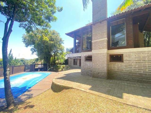 Casa em condomínio fechado com 3 quartos à venda na ALOYSIO MALDANER, 1270, Centro, Dois Irmãos, 380 m2 por R$ 1.196.000