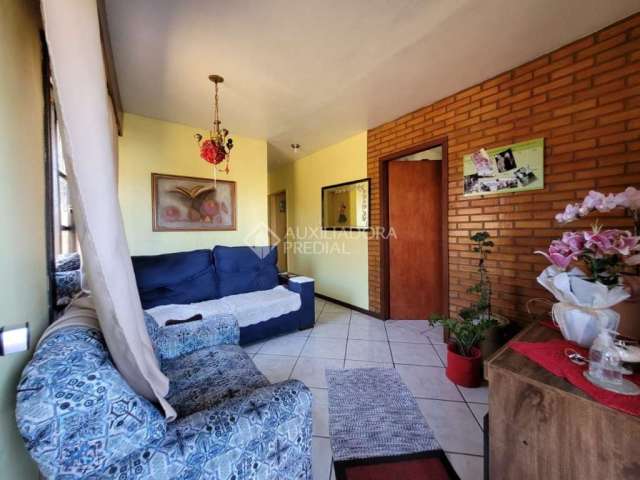 Casa em condomínio fechado com 3 quartos à venda na Rua Barão de Rio Branco, 353, Operário, Novo Hamburgo, 150 m2 por R$ 380.000